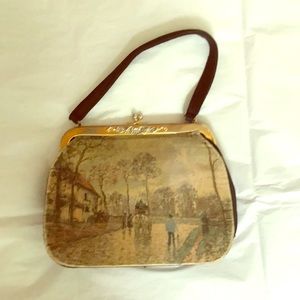 Vintage handbag with coordinating wallet.